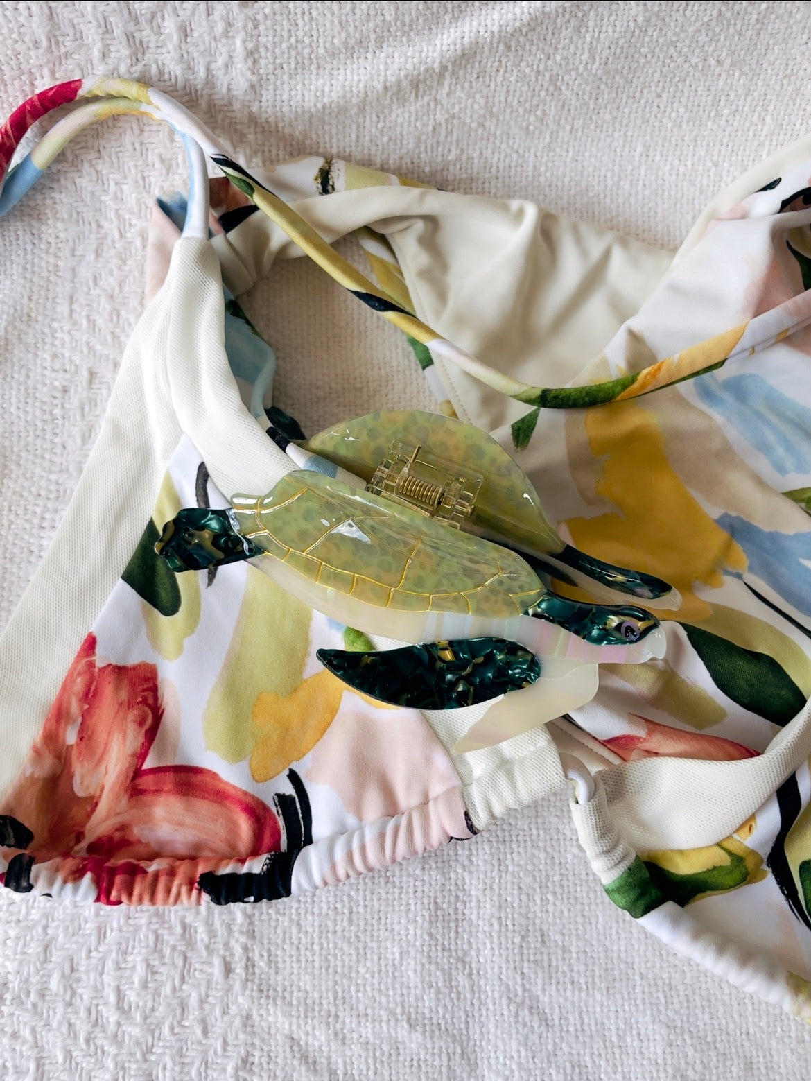 Sea turtle hair clip paired with cut floral bikini